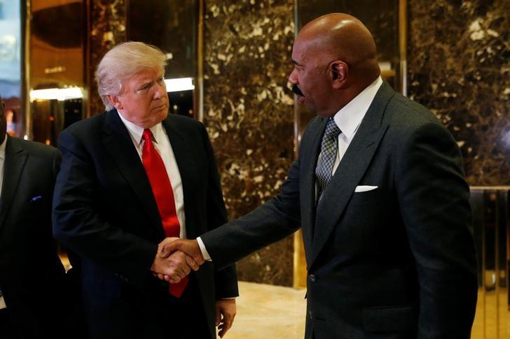 U.S.President-elect Donald Trump shakes hands with television personality Steve Harvey after their meeting at Trump Tower in New York